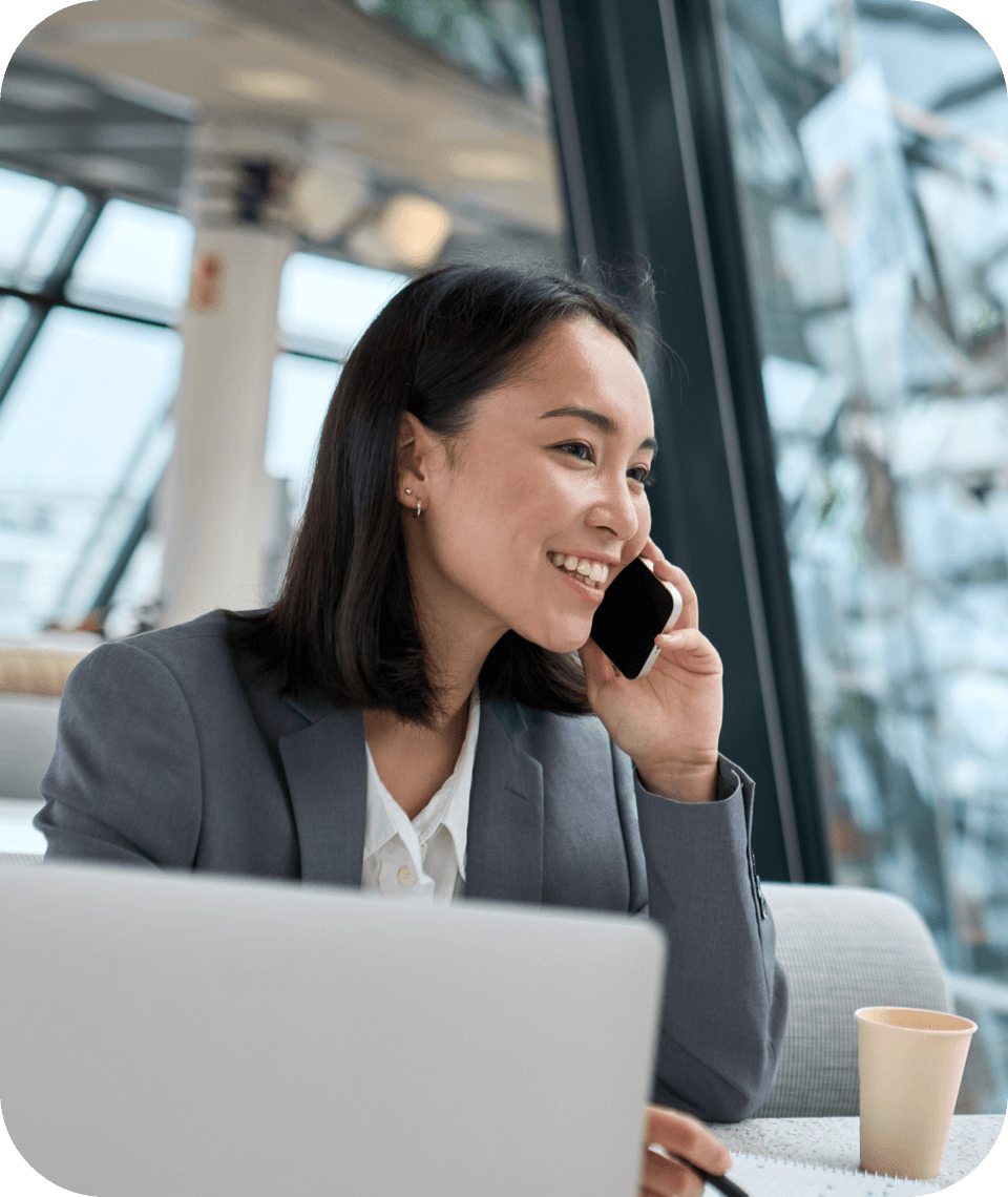smiling business woman on cell phone