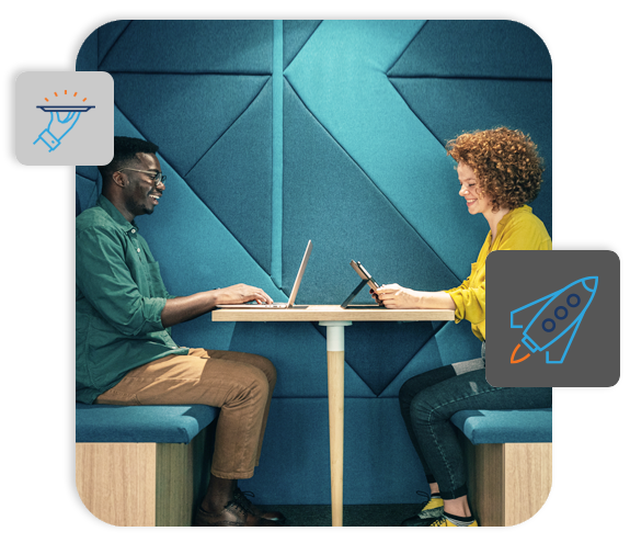 a male and female coworker meeting at a table