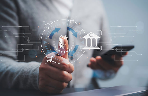 A man with his right thumb upraised using a virtual fingerprint scanner with a smartphone in his left hand, superimposed with a bank icon.