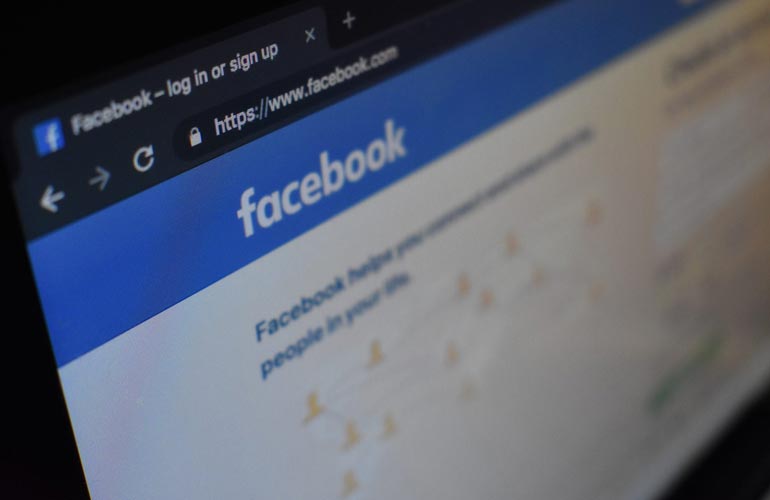facebook site shown on a laptop