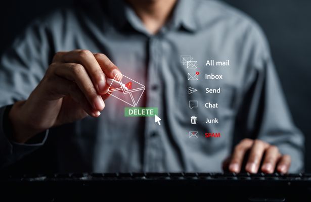 man using a pointer to touch an email icon with the word delete written below it