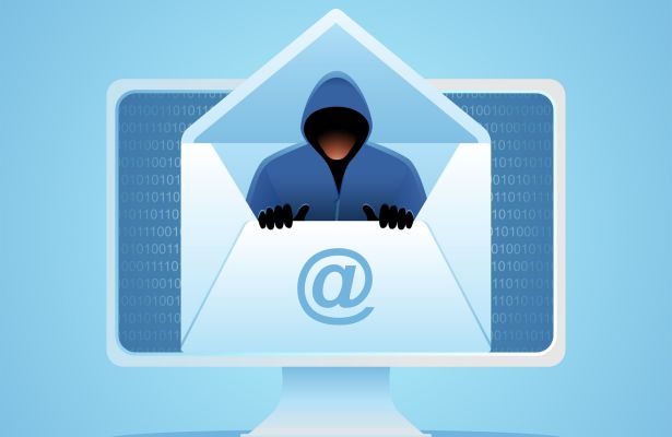 Monitor with a man in a hoodie inside an envelope superimposed